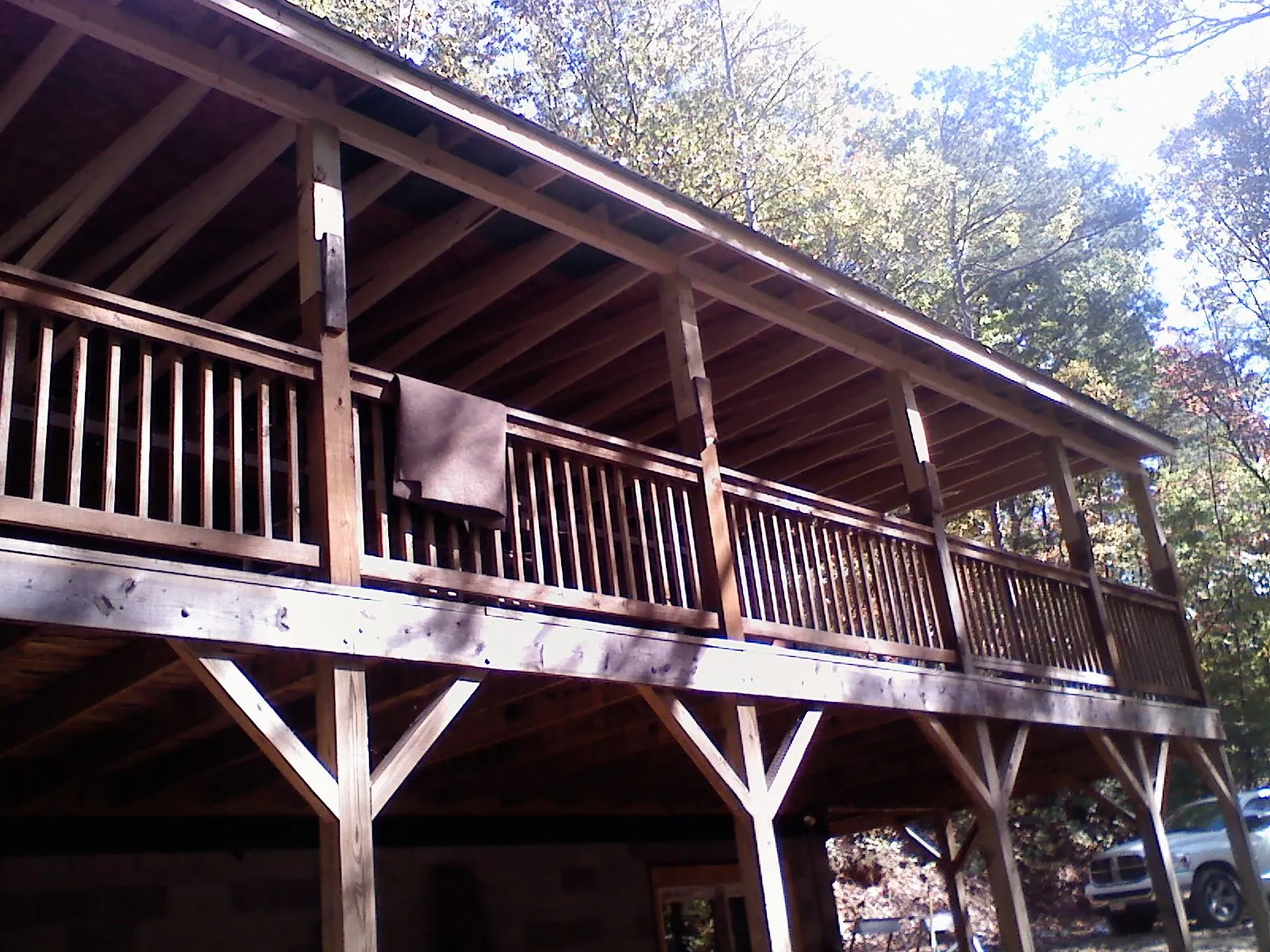 Timber framing under a new elevated porch and deck — Roof Leak Repair in Pell City by Roofing Brothers
